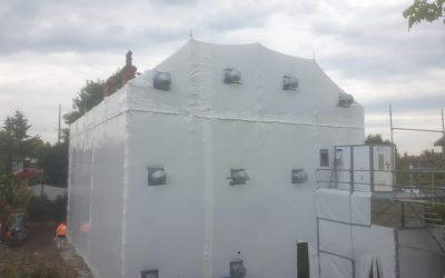 Comment traiter une façade amiantée avec des solutions de confinement ?